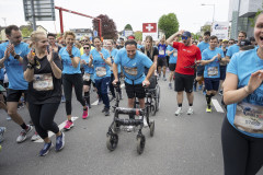 Michel Roccati (C) of Italy competes during the Wings for Life World Run Flagship Run in Zug, Switzerland on May 07, 2023.